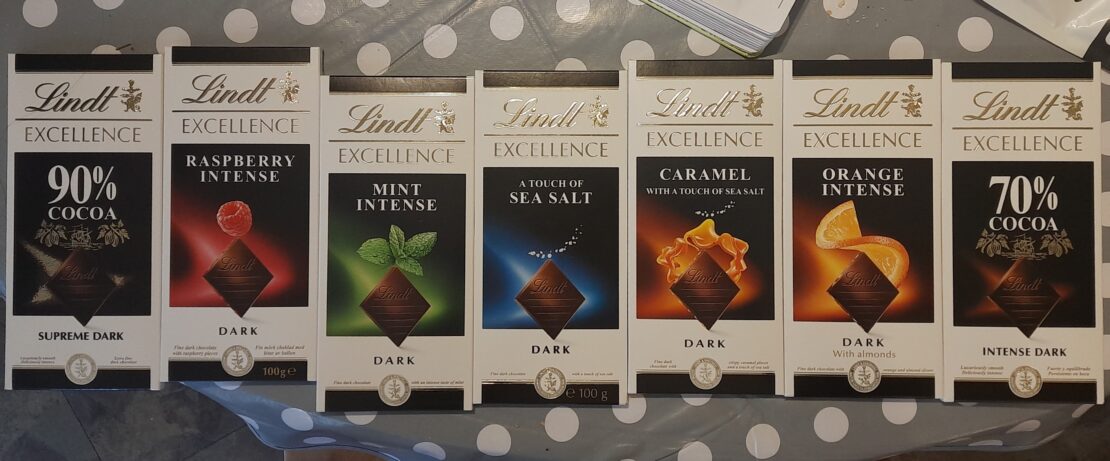 A row of seven different types of chocolate which the Scouts had to identify whilst holding their nose.